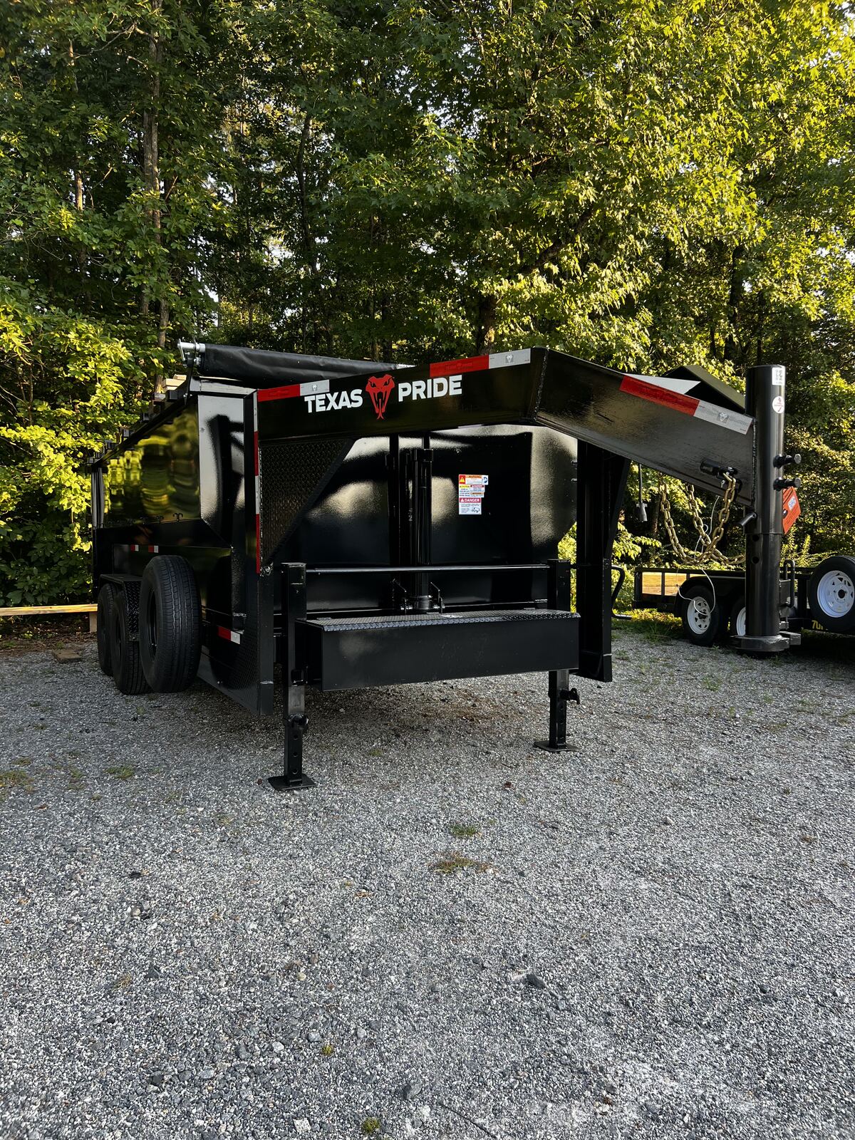 Dump trailer parked at a job site