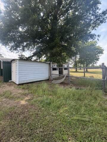 Sheds lined up for removal