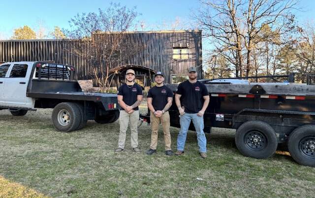 The Junk Hawgs crew with their truck