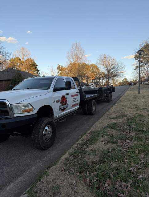 Junk Hawgs truck on a River Valley road