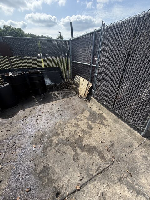 Cleared corner of a commercial yard after cleanup