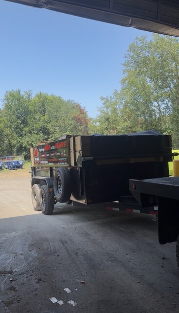 Junk Hawgs branded trailer loaded and ready to haul