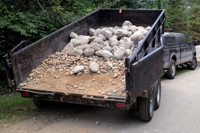 Dump trailer loaded with debris